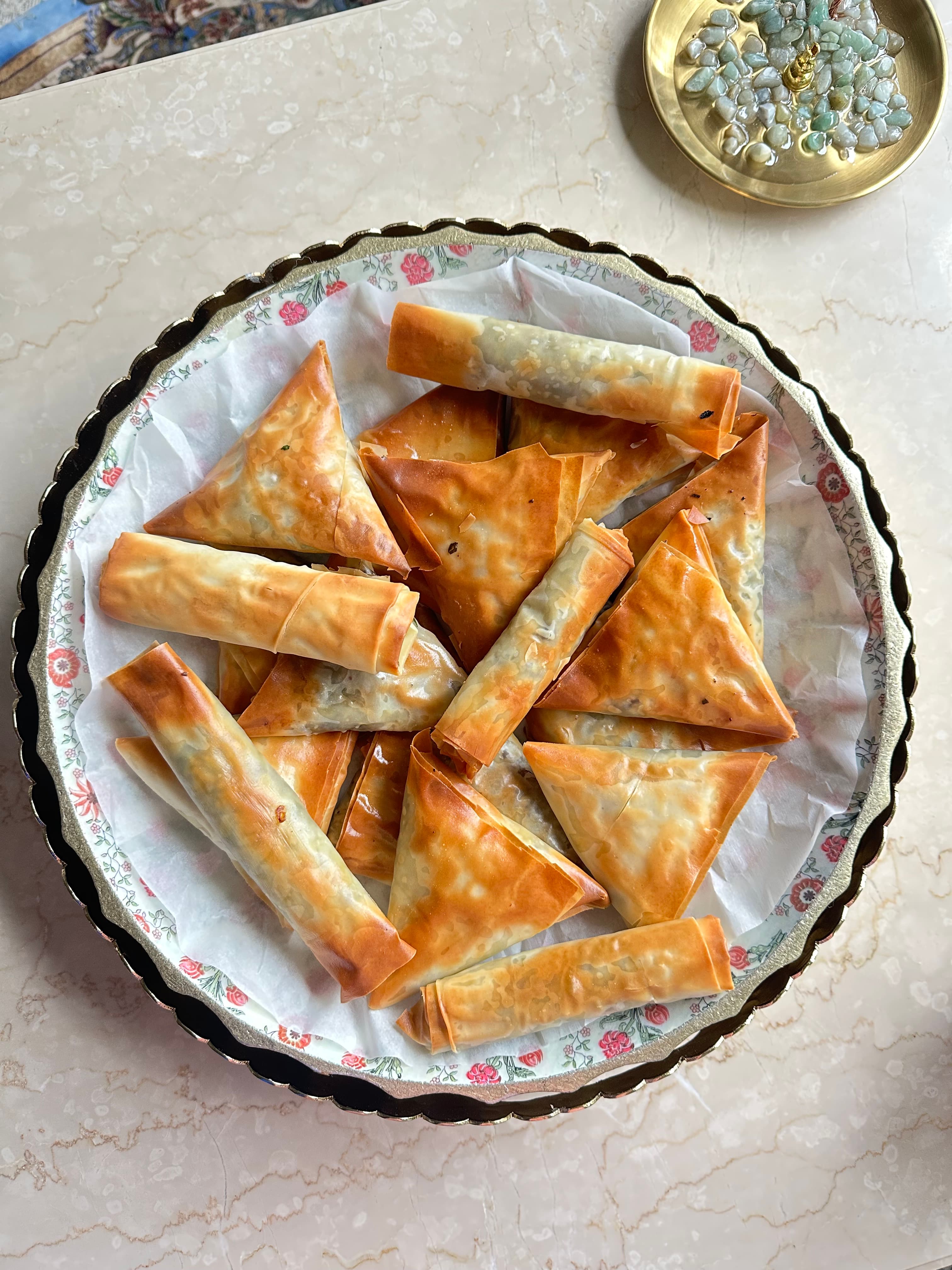 sambousek (also known as sambousa or sambusa).